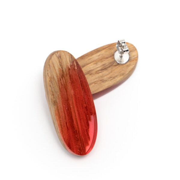 Red earrings by jewelery artist Eneken Volkov