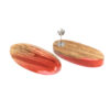 Red earrings by jewelery artist Eneken Volkov